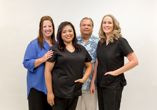 Picture of three Outpatient Cardiopulmonary Rehabilitation Staff ( three females) and one male, smiling.