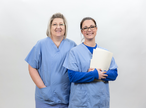 Picture of two outpatient services Nurses, smiling.