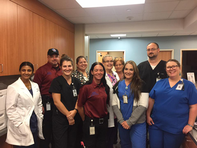 Picture of Hurricane Support JCHD Staff smiling. There is eight females and two males smiling.